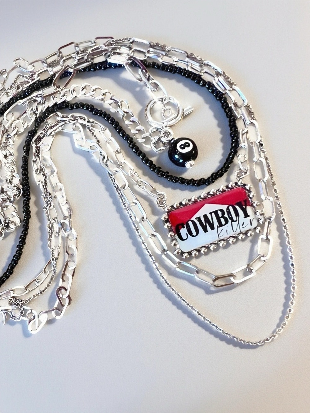 Layered 5 necklace black, red, and silver necklace set with matching earrings